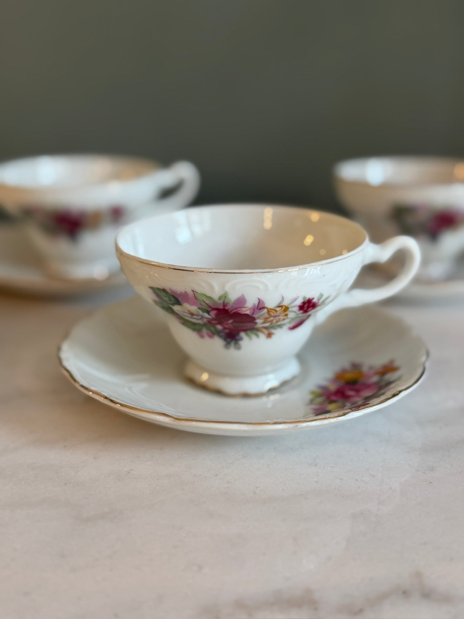 Vintage Footed Teacup and Saucer Roses and Lilies Gold Trim Made in Japan