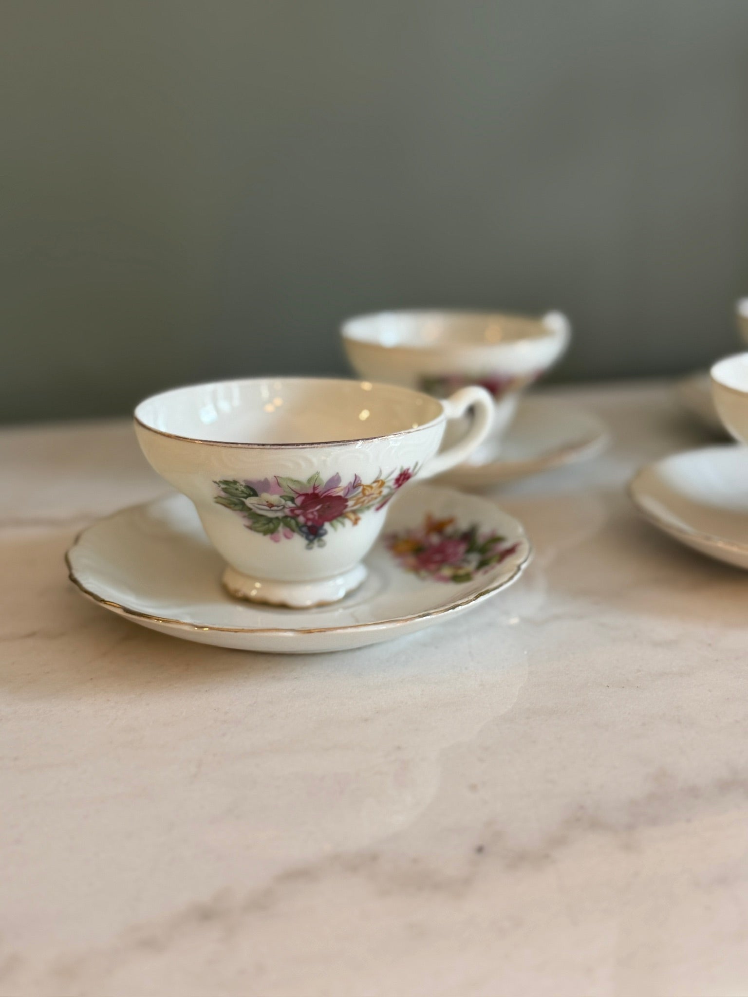 Vintage Footed Teacup and Saucer Roses and Lilies Gold Trim Made in Japan
